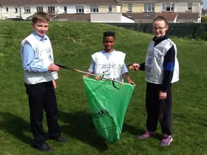 Our hard-working Green Schools committee cleaning up our school