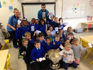 Ms Clancy's Junior Infants meet Sam Maguire